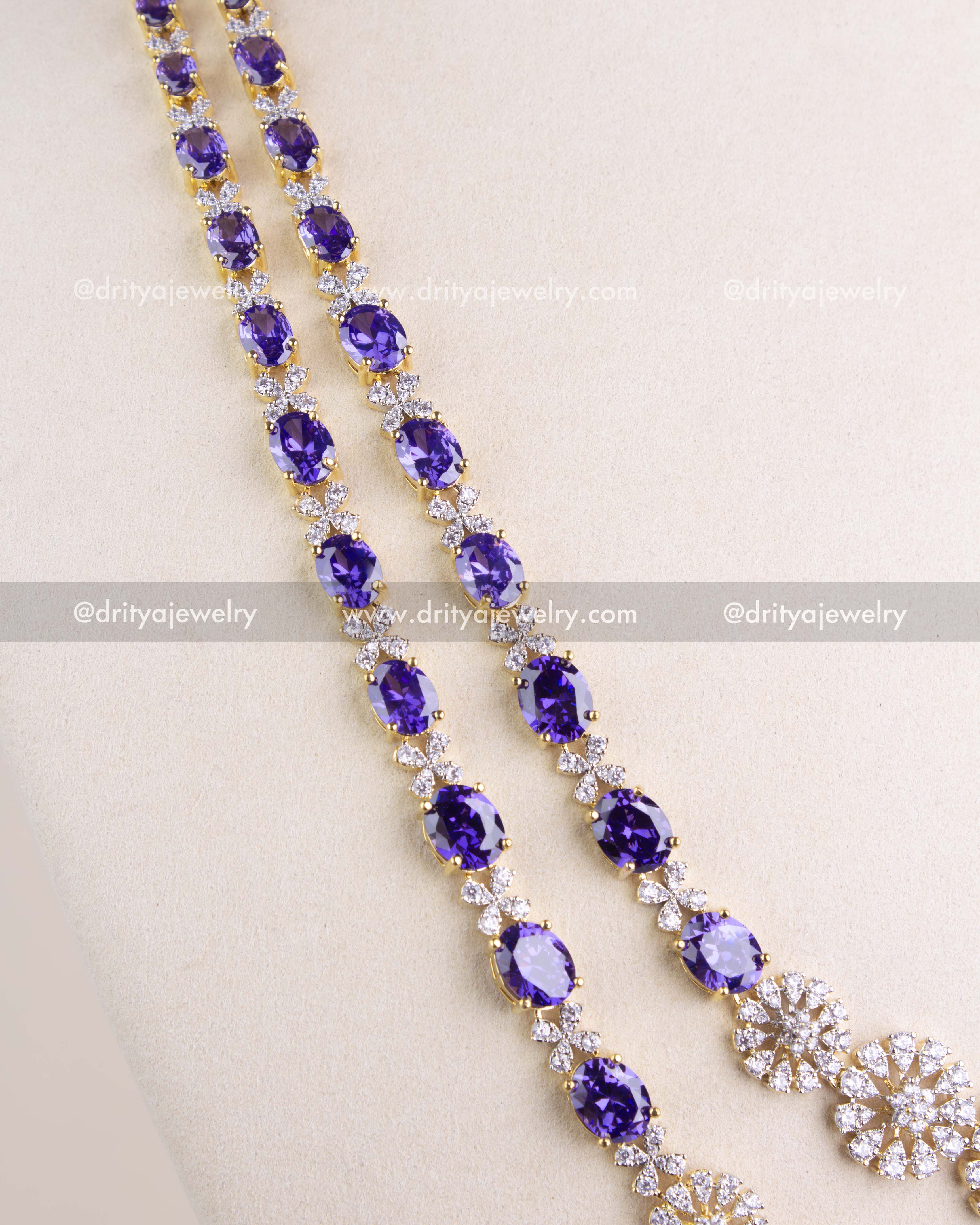 1215-PU side view of layered purple oval stones and CZ links