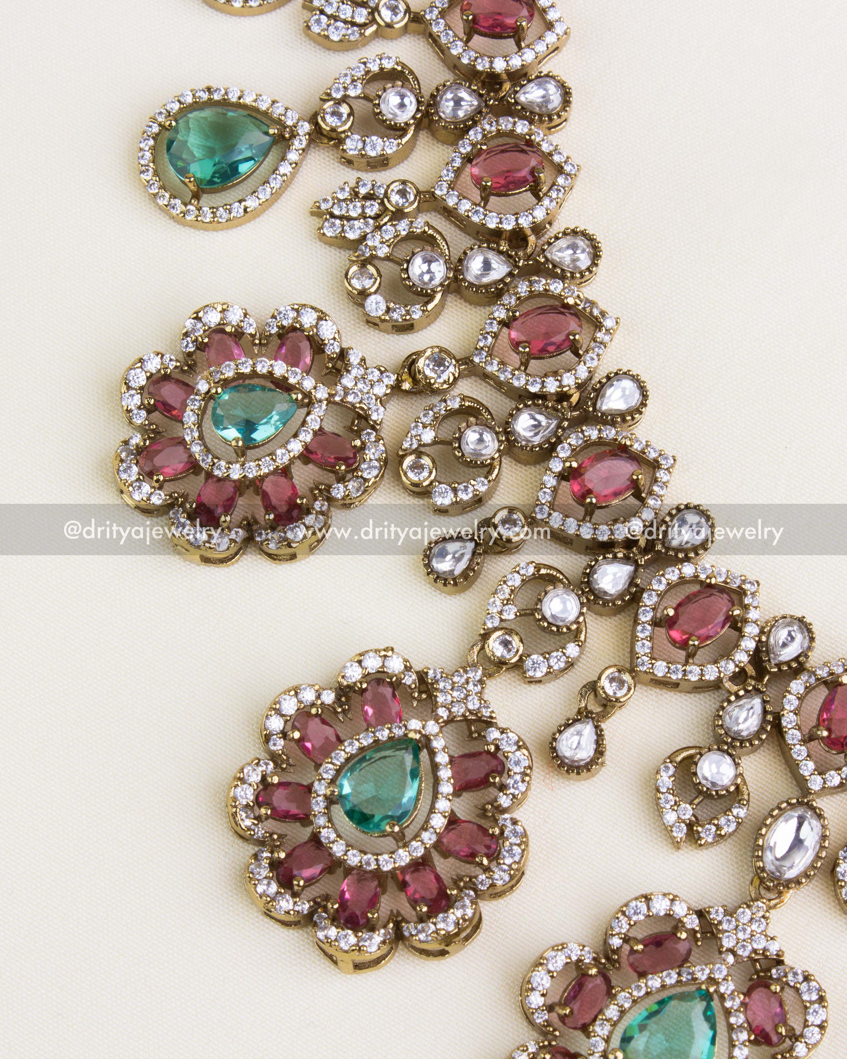SKU 1135 - Necklace Set - Angled close-up of Victorian style necklace links and pendants