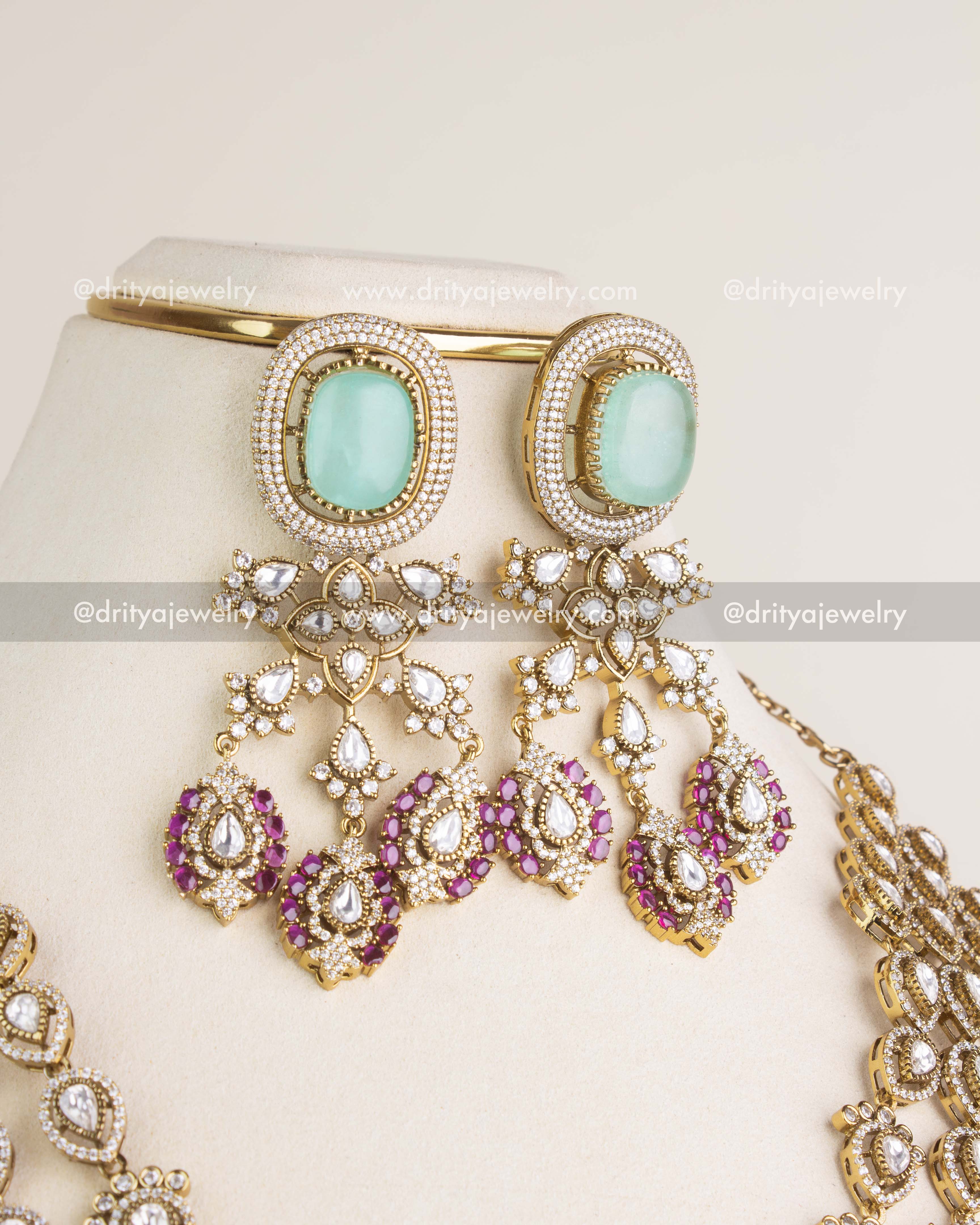 SKU 1131 Necklace Set close-up of matching green stone chandelier earrings with ruby drops