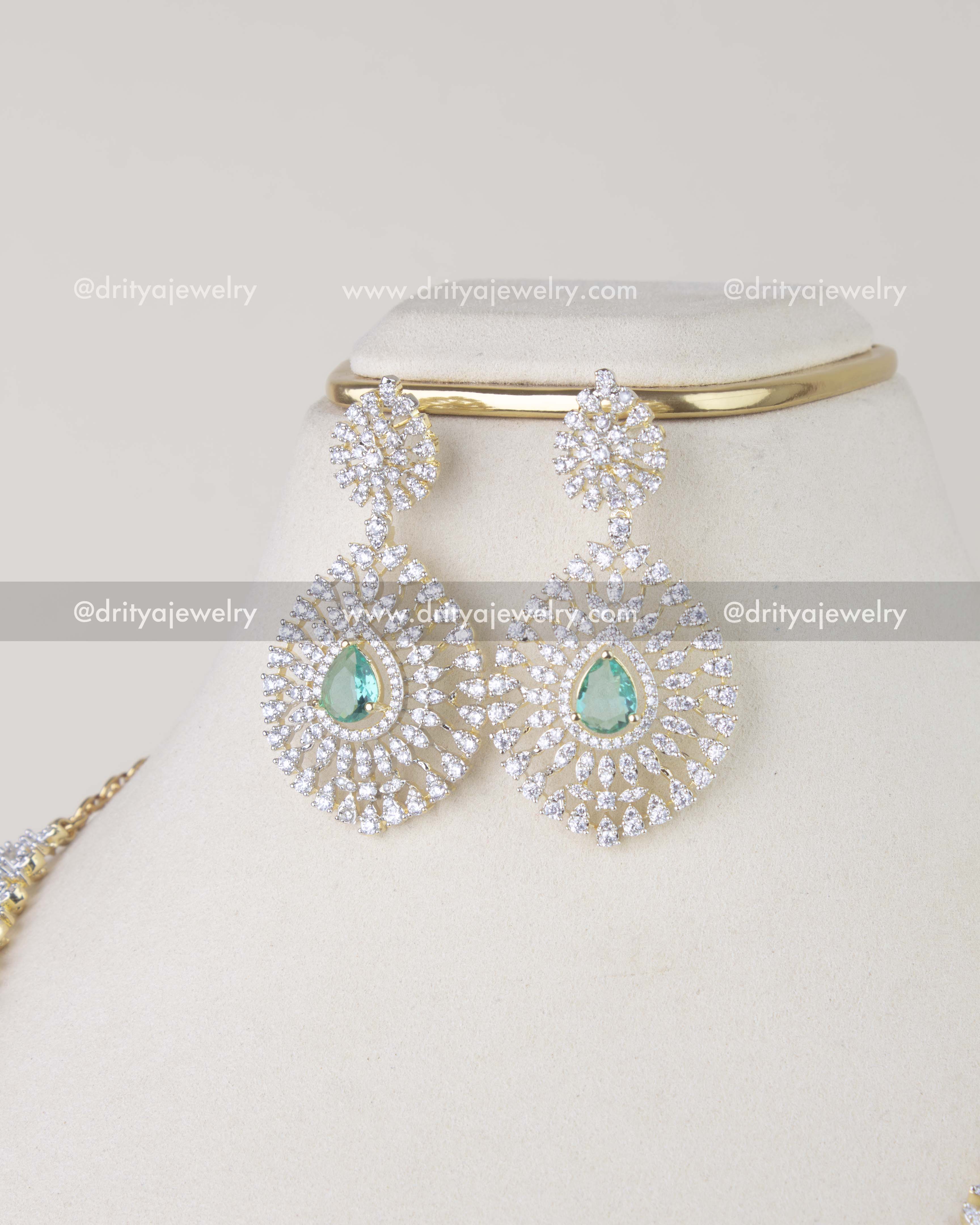1214-RE emerald CZ dangler earrings front view