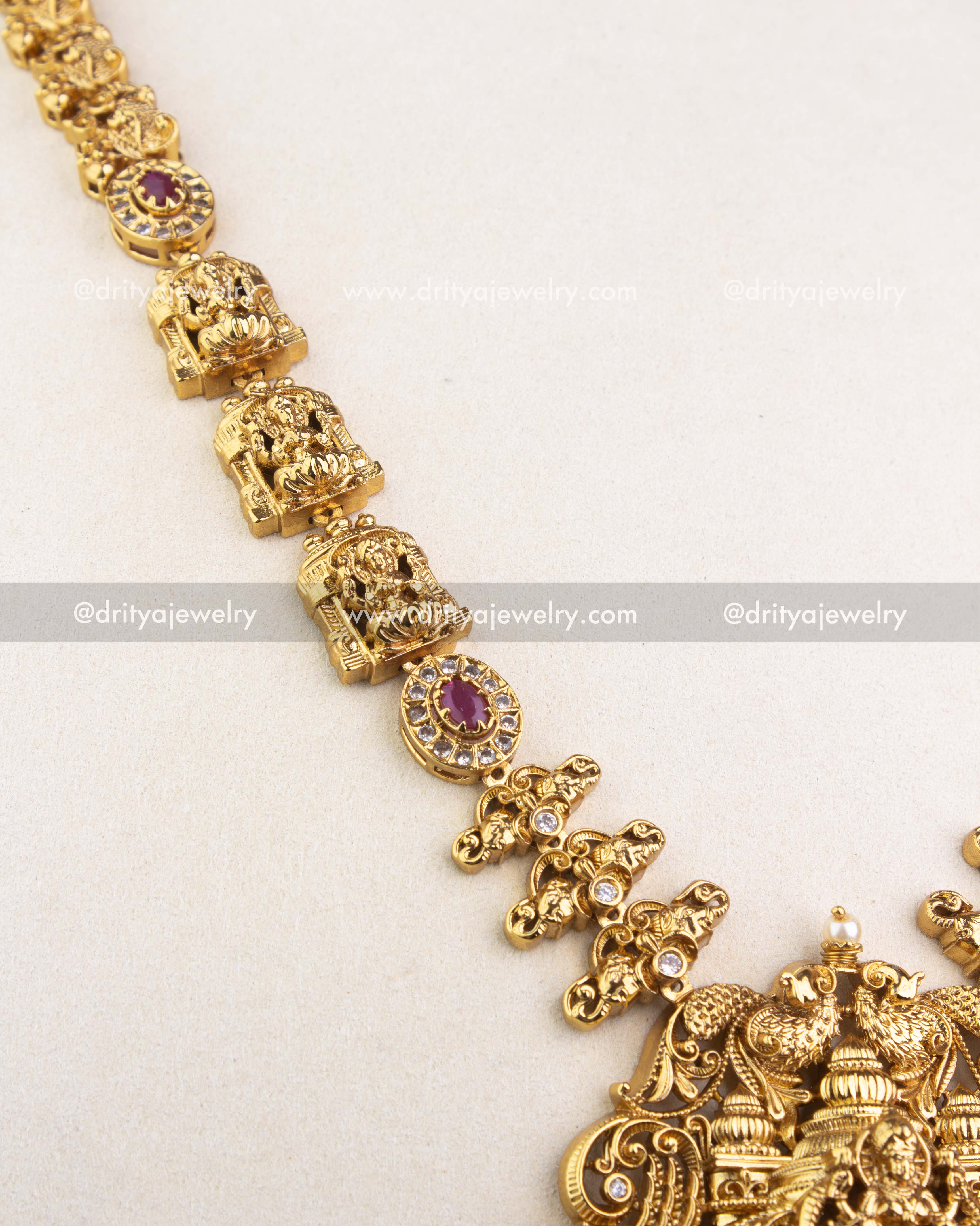 1240-R detailed view of temple necklace links with deity motifs and ruby stones