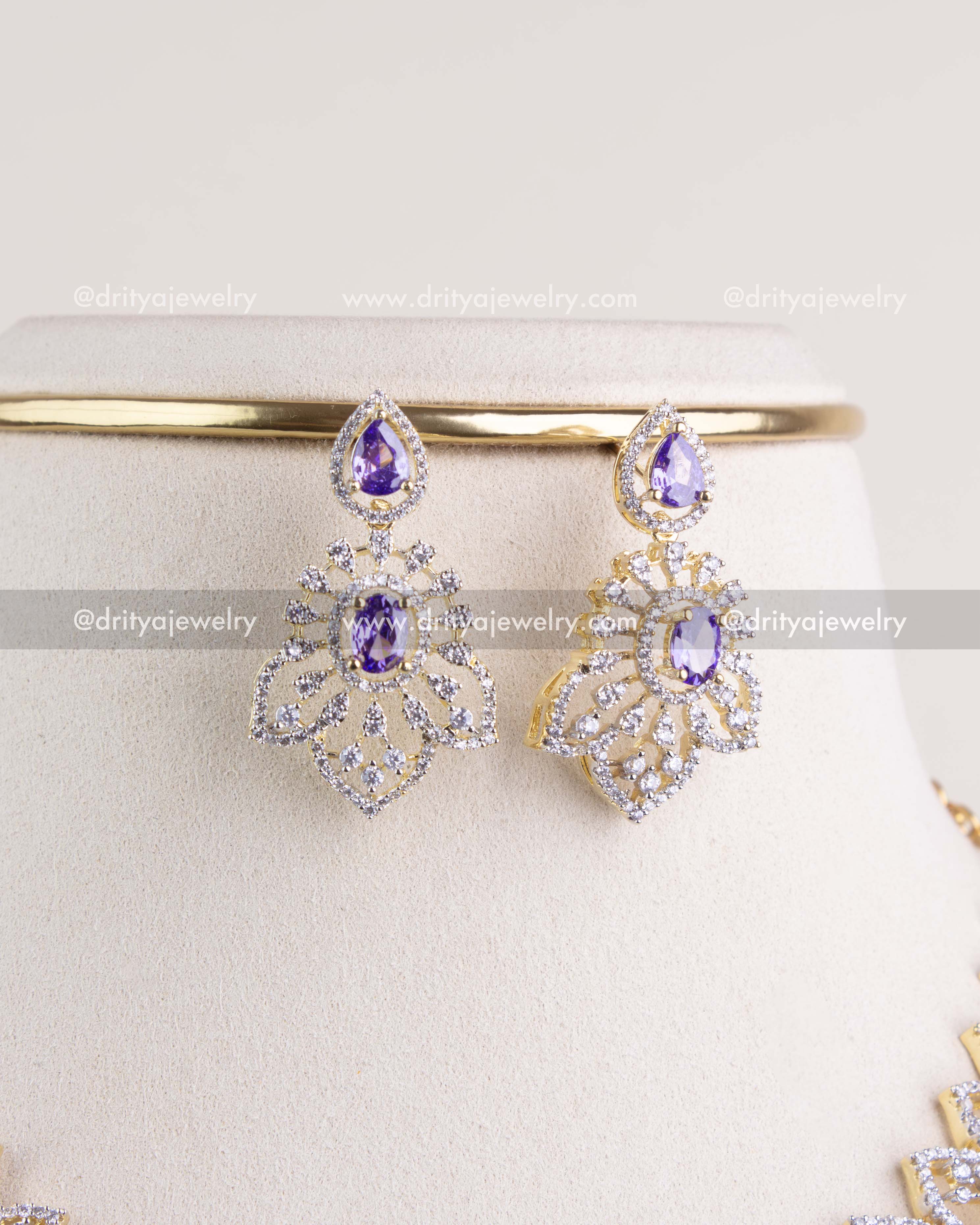 1232-PU matching dangler earrings close-up with purple stones