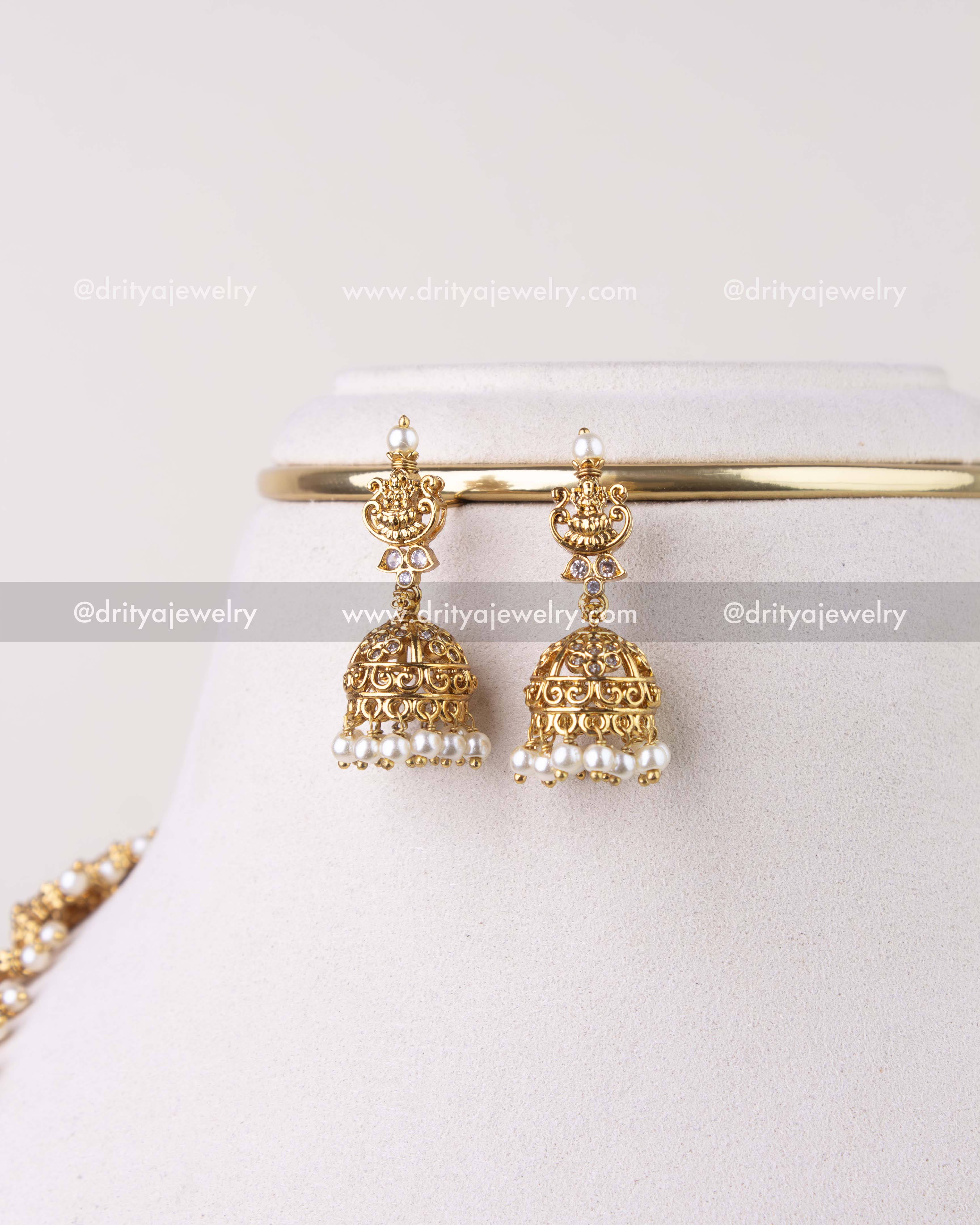 1279-G matching small gold replica jhumka earrings with pearl drops close-up