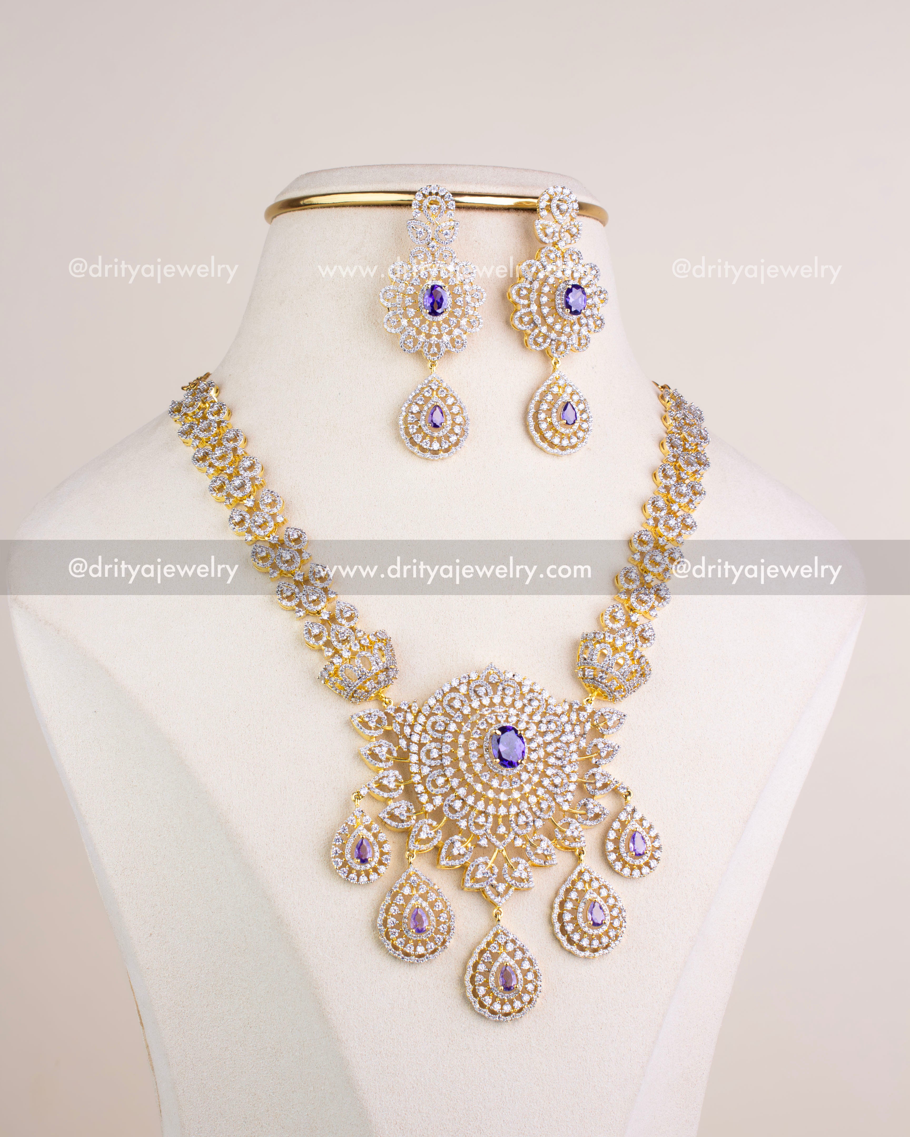1229-PU Complete short necklace set with matching dangler earrings on display