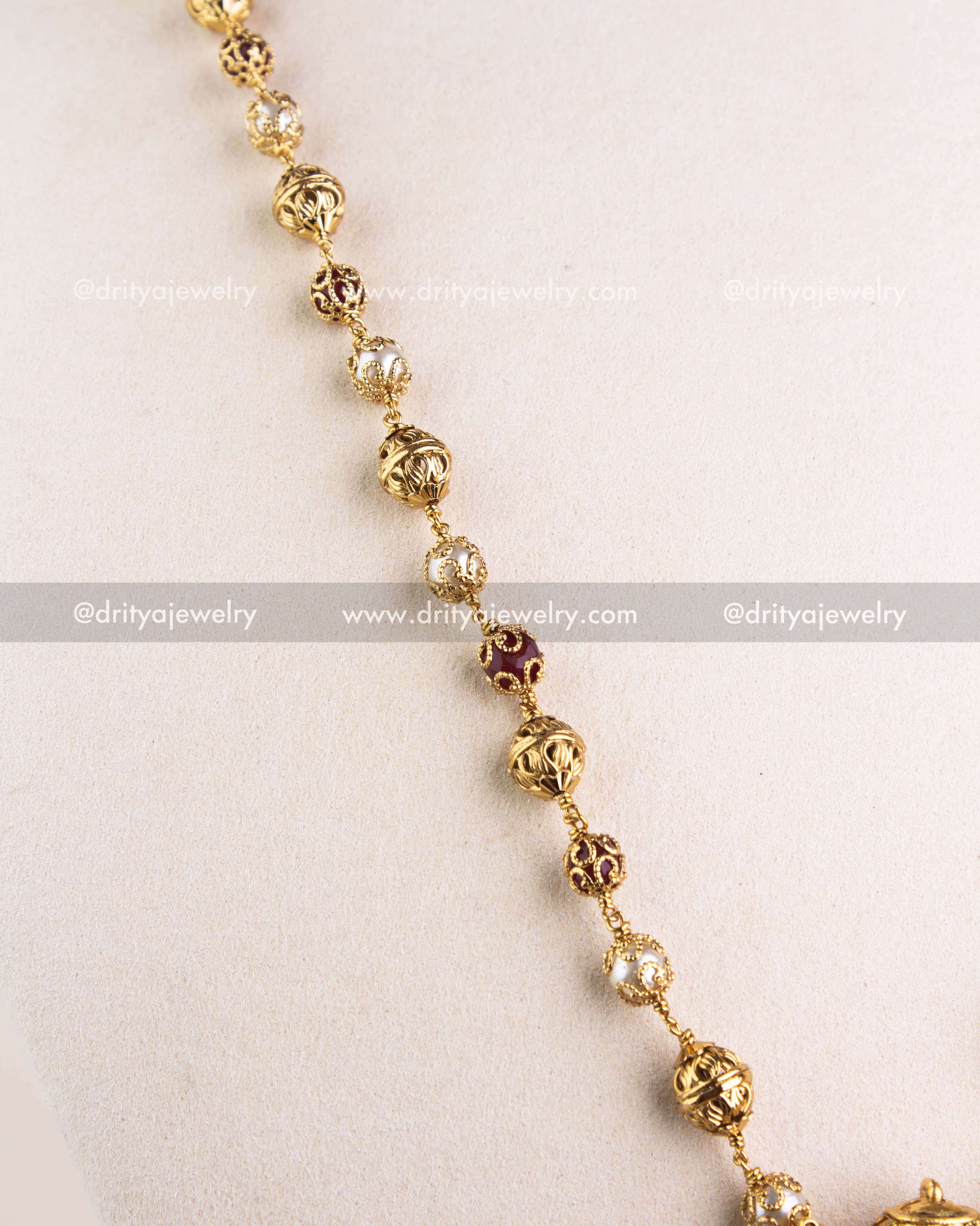 1123-N detailed view of ornate gold-toned bead mala chain