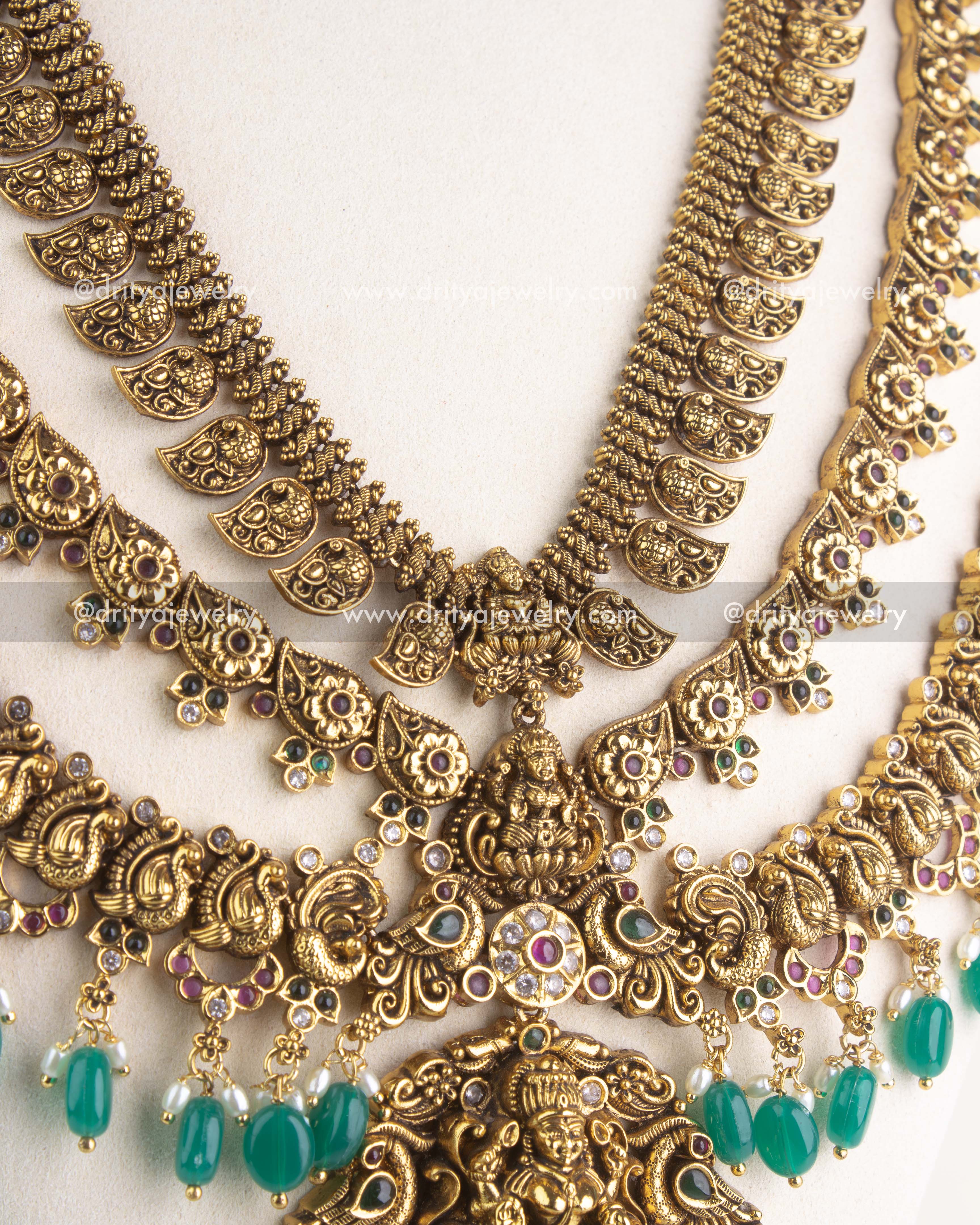 SKU 1164 Necklace Set detailed view of layered temple-style chains with floral and paisley motifs.
