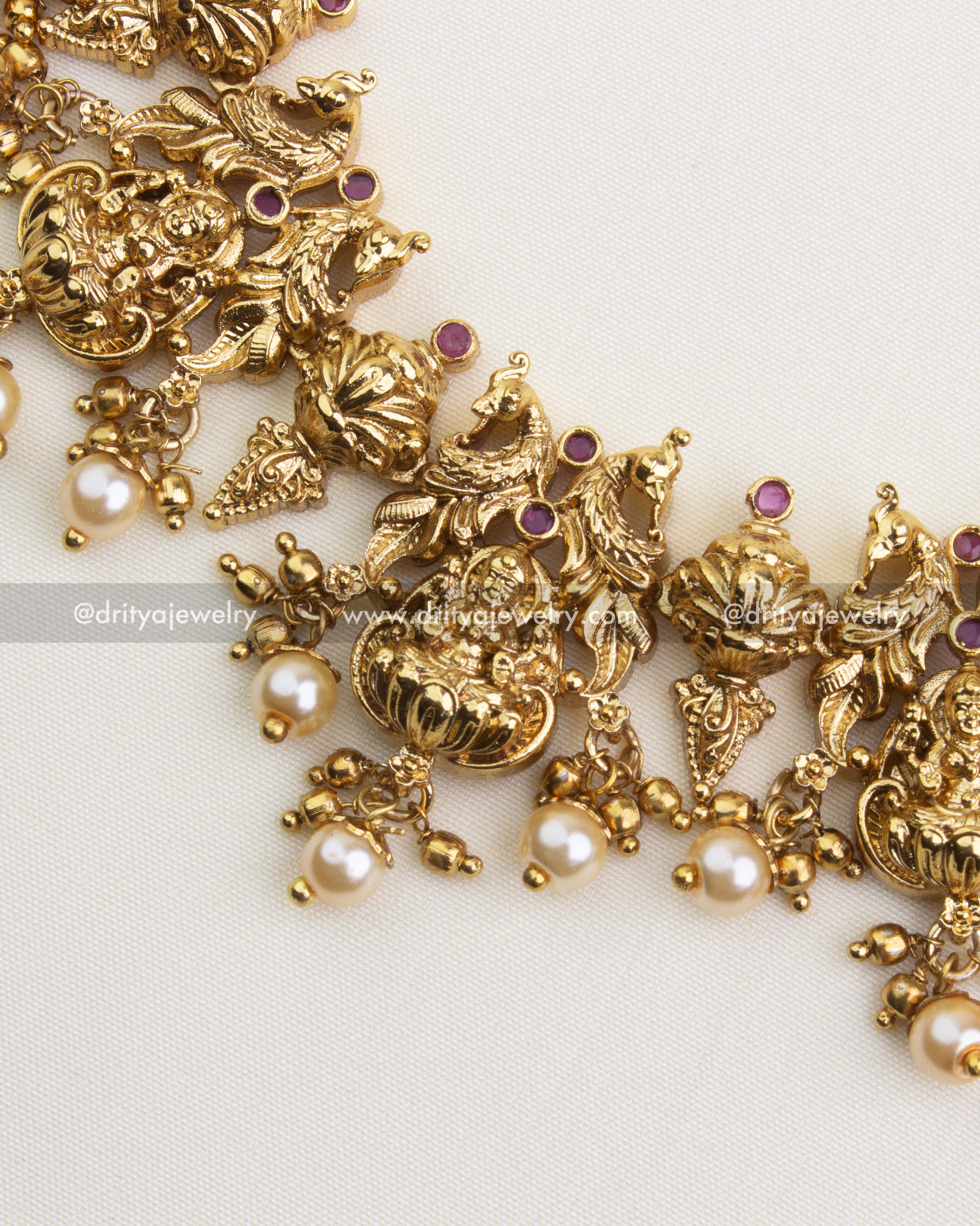 SKU 1127 Necklace Set close-up of central god idol motifs with pearl clusters