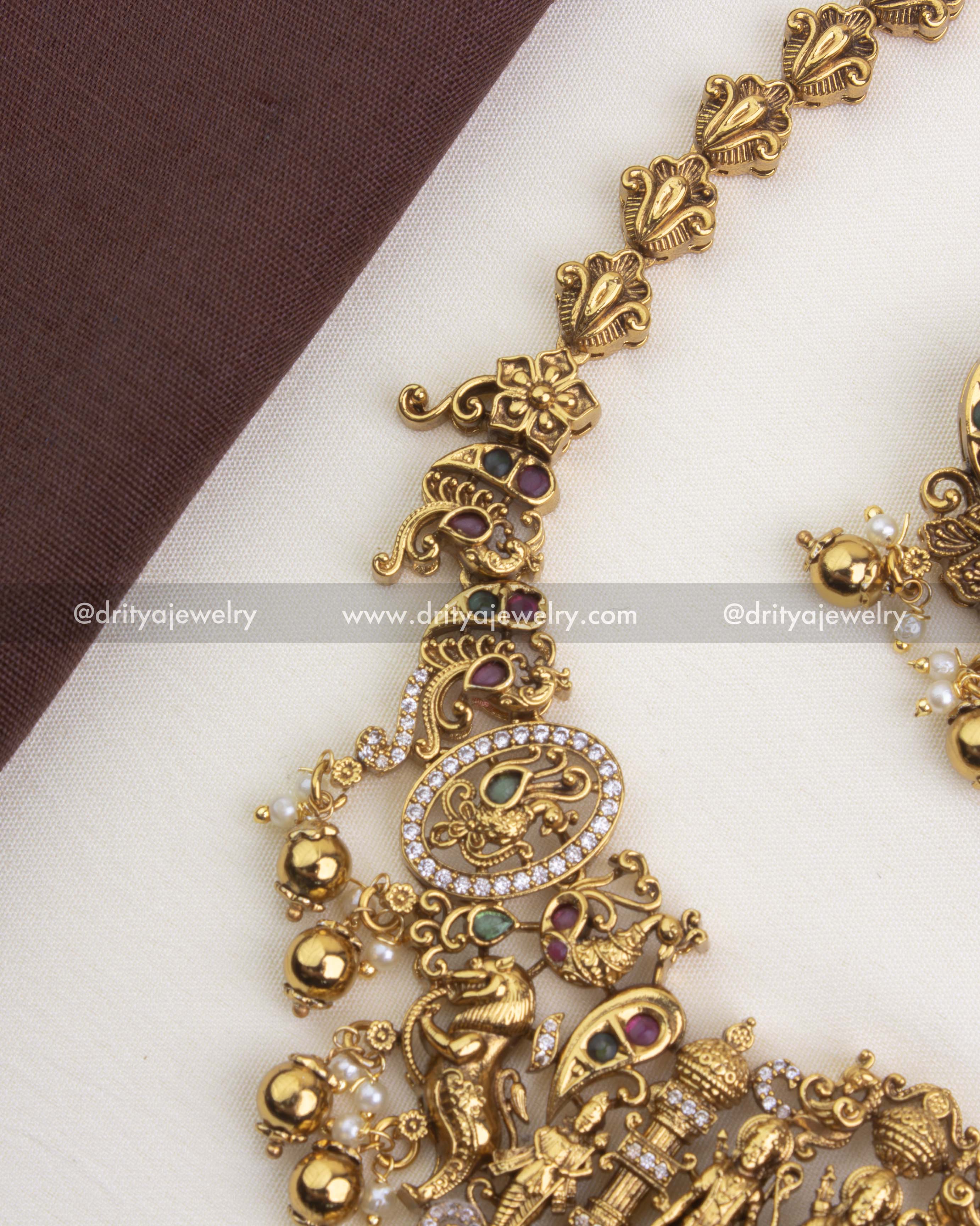 SKU 1247 close-up of antique gold-plated side links and stones on necklace