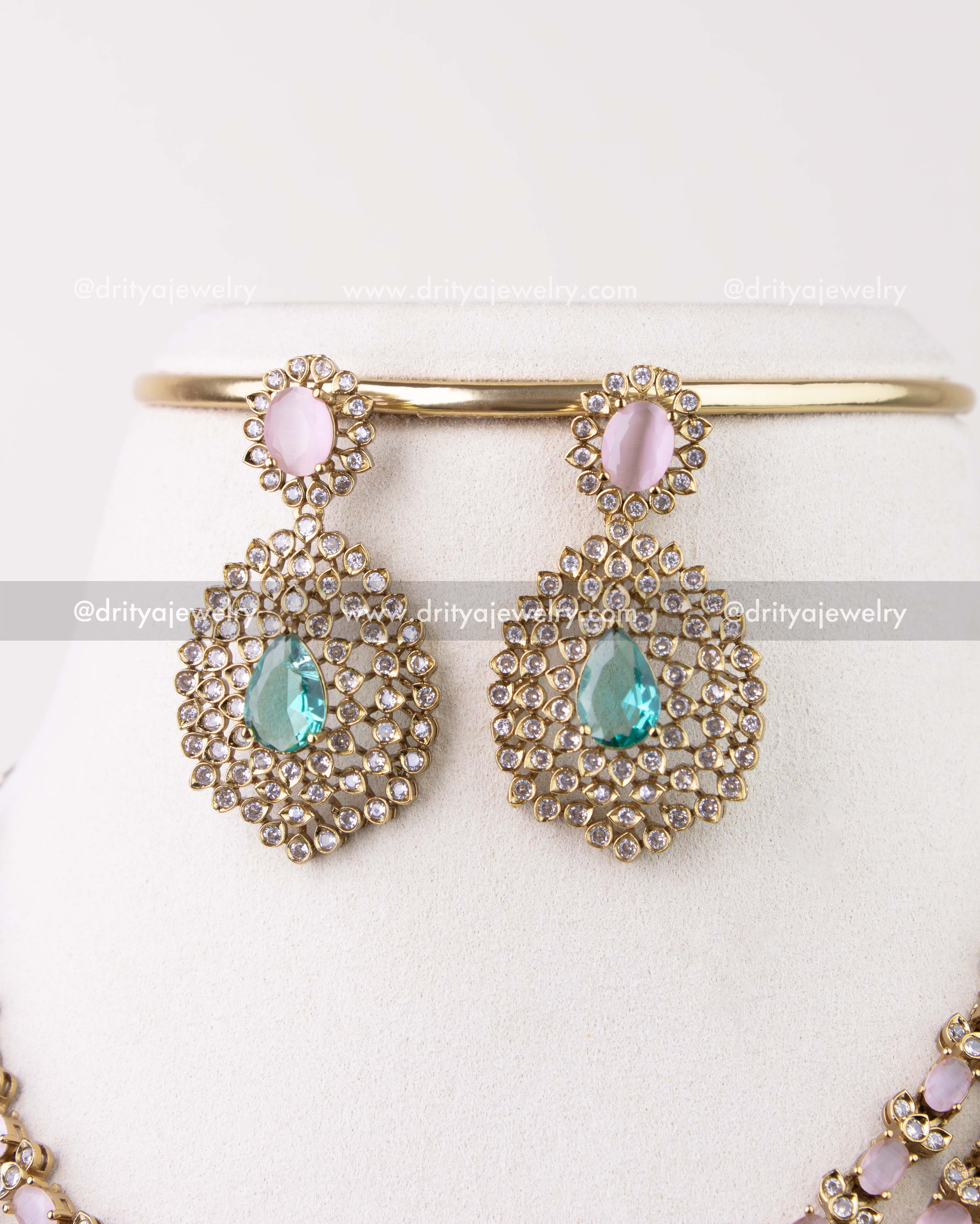 1296-BP layered necklace set earrings close-up with mint teardrop centers