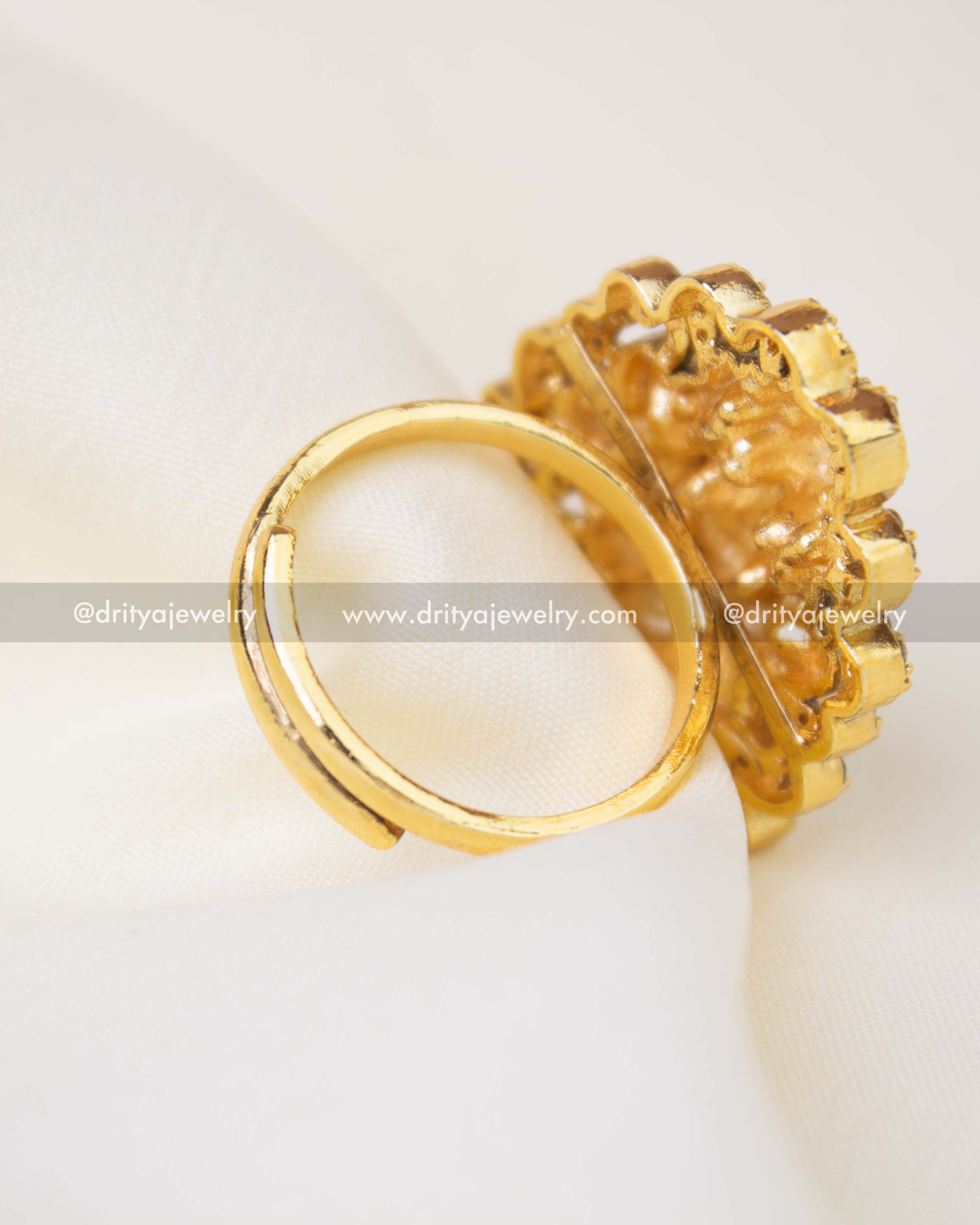 Adjustable antique gold temple finger ring with open band design