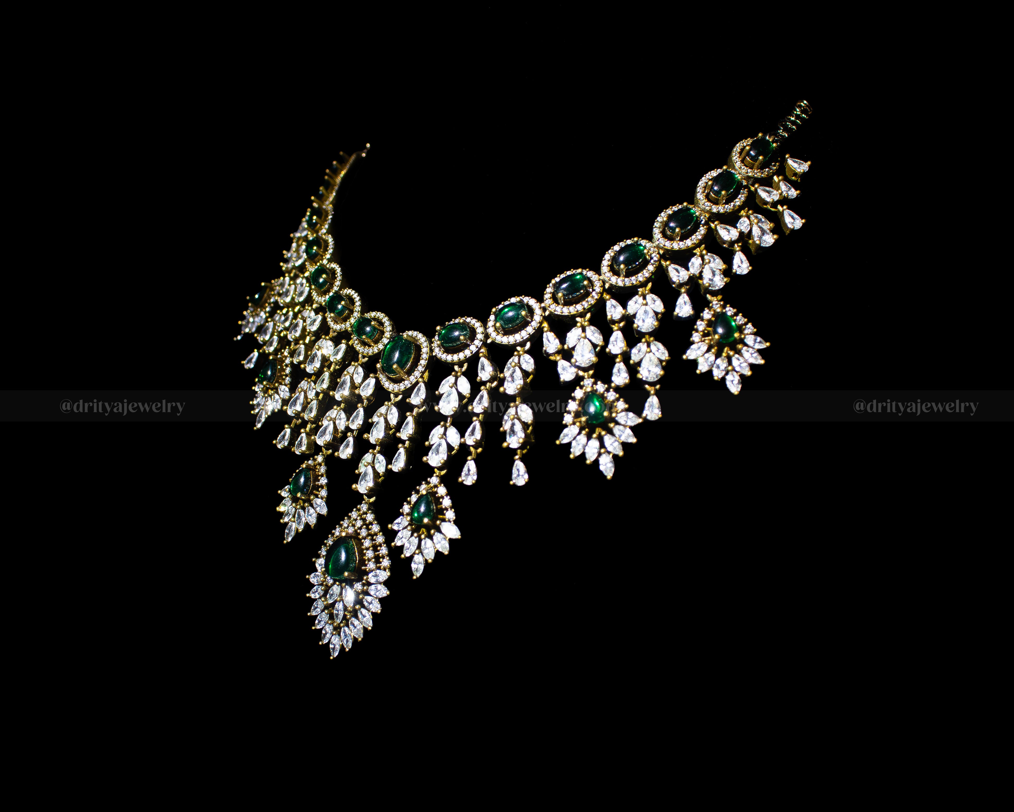 Different angle view capturing the elegance and intricate design of the Mehndi Victorian necklace adorned with emeralds and crystals.