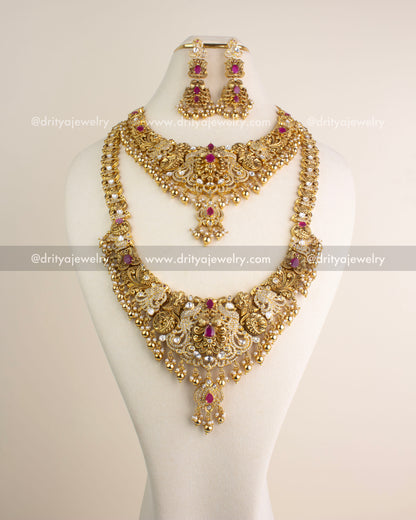 Full view of the premium antique combo set including long necklace, short necklace, and danglers, detailed with ruby-red stones and polki kundan work.