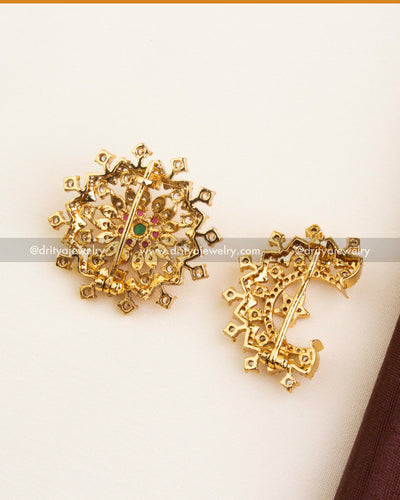 Back side of CZ-studded hair accessories showing secure locking pins and gold structure.