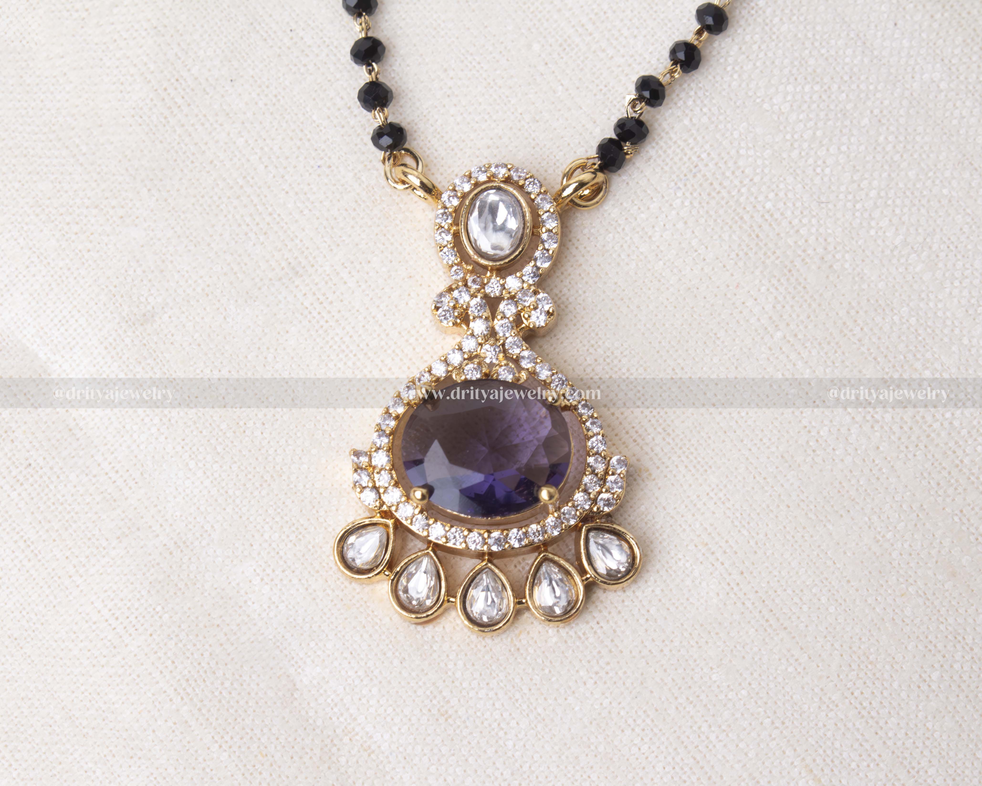 Elegant black crystal bead necklace with a vibrant Reverse AD pendant, perfect for enhancing evening outfits.