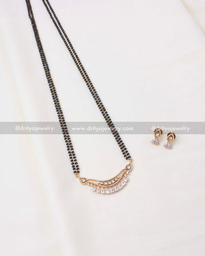 Double-lined black beads necklace with CZ teardrop pendant