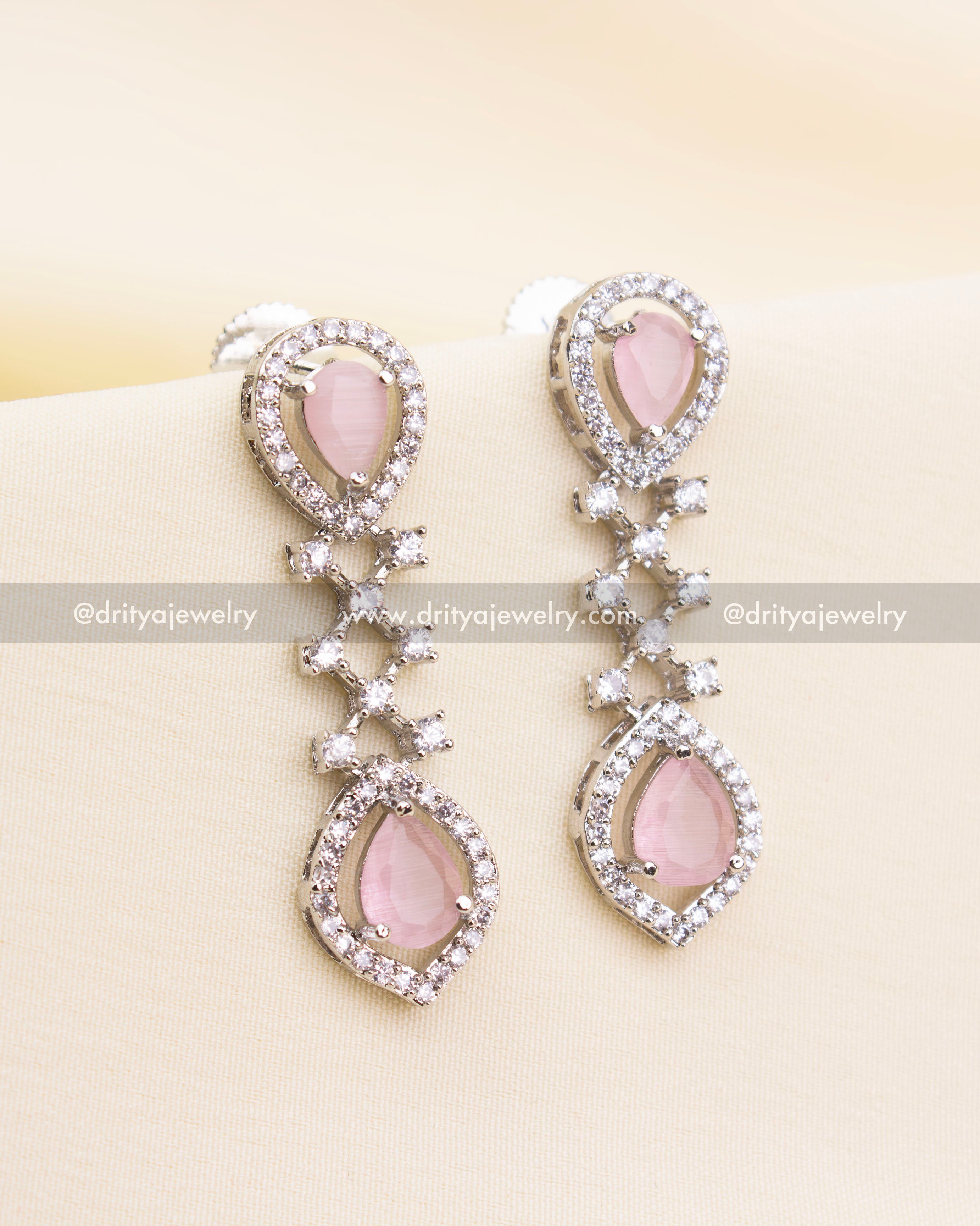 Elegant earrings with blush pink teardrop stones and American Diamonds