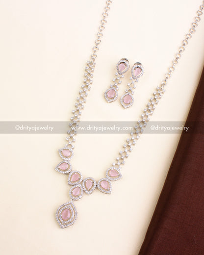 Zircon necklace set featuring blush pink stones and AD work with matching earrings