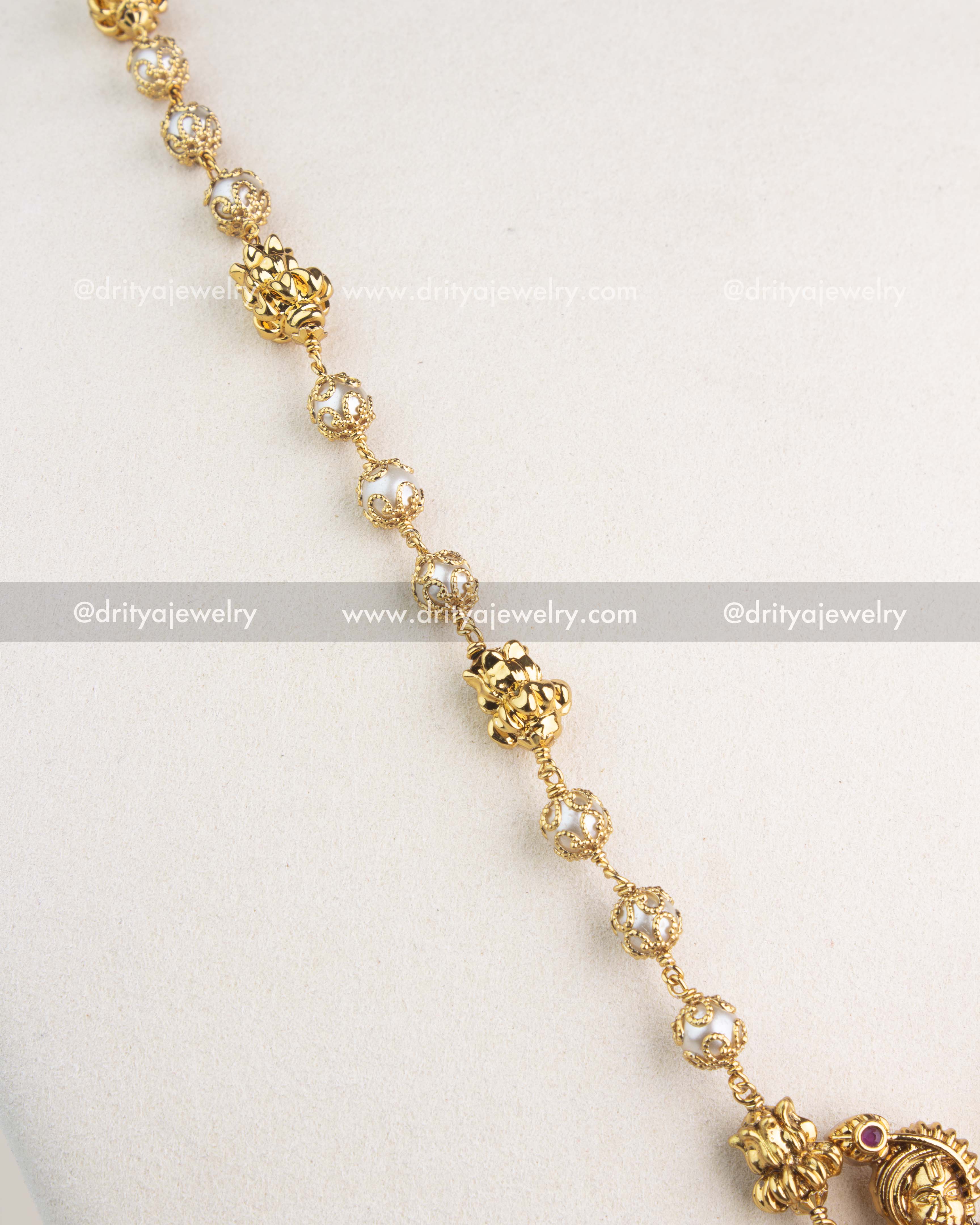 Gold-toned beaded chain with pearl embellishments for Krishna pendant necklace.