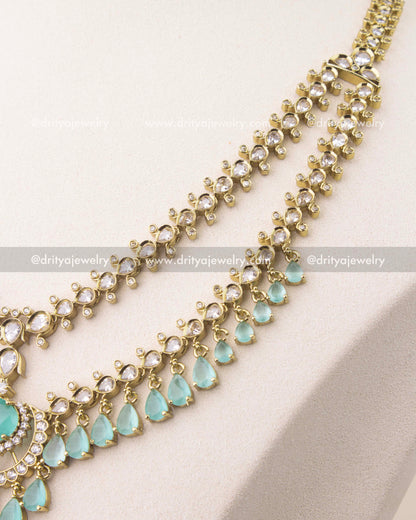 close up of Premium Victorian layered necklace set with mint green stones and gold finish