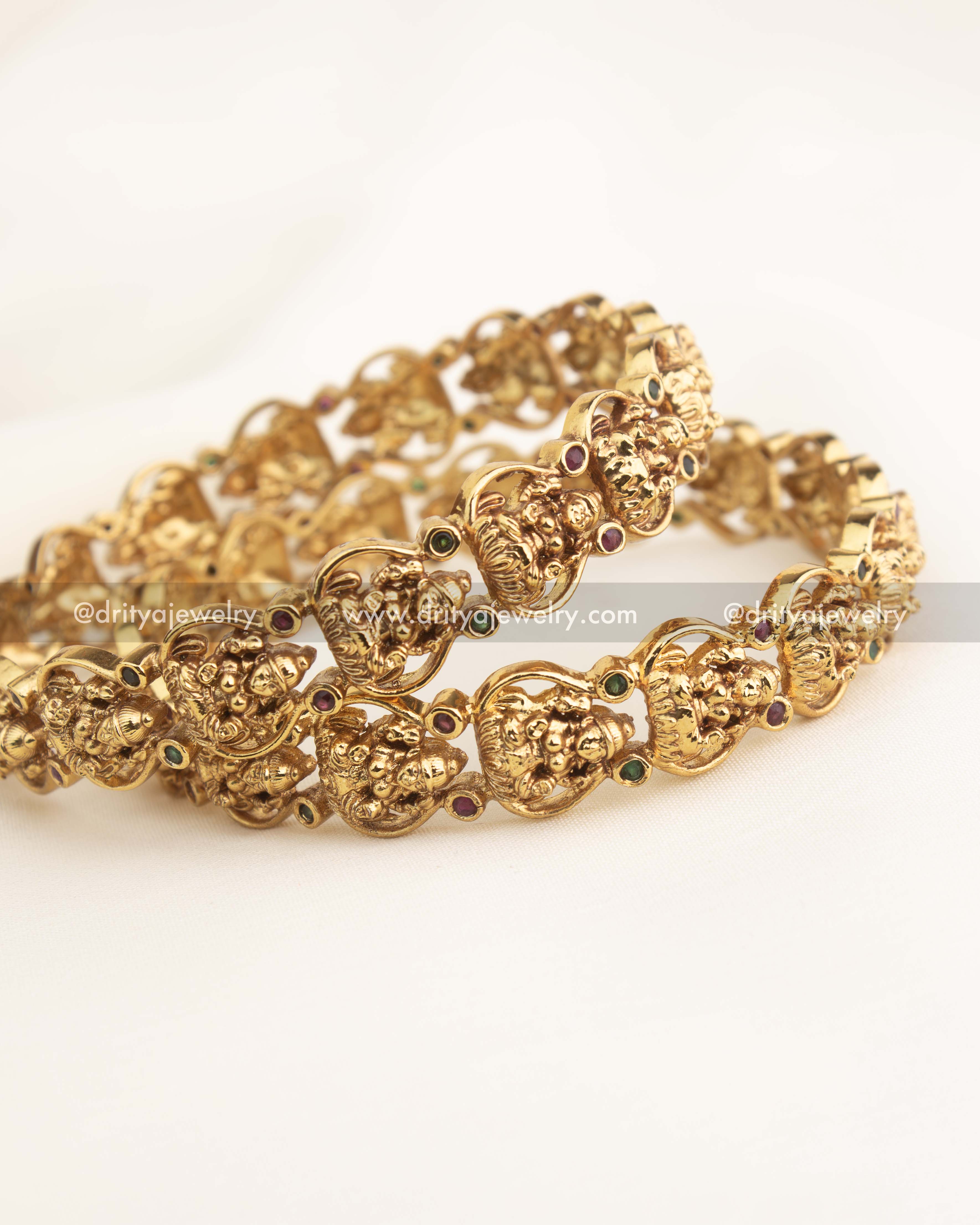 Simple Gold Replica Temple Bangles with Goddess Motif