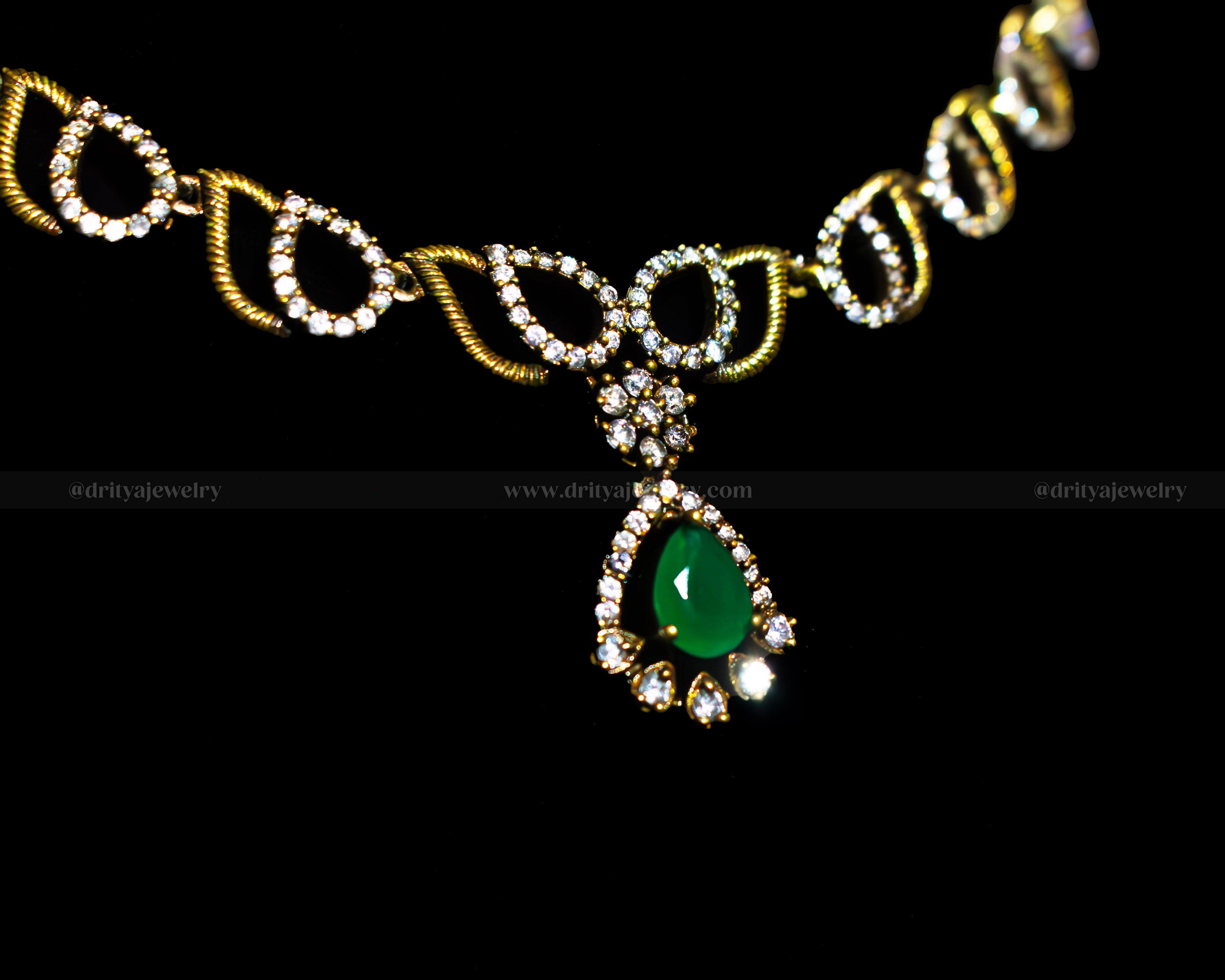 Close-up view of the green gemstone pendant on the Mehndi Victorian Necklace by Dritya Jewelry, highlighting its detailed craftsmanship and crystal embellishments.