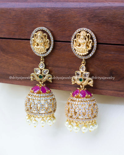 Traditional Lakshmi stud design with CZ stones in a premium jhumka set.
