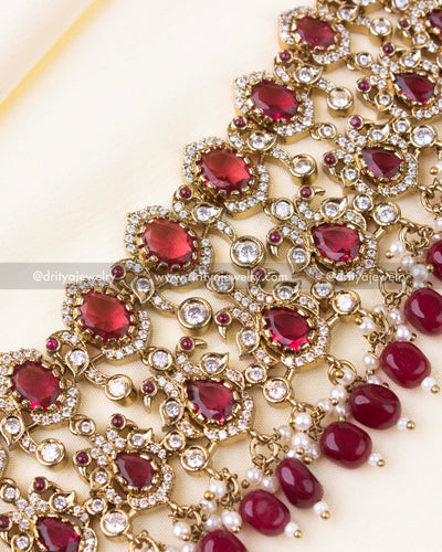 Detailed view of ruby bead drops and AD setting.