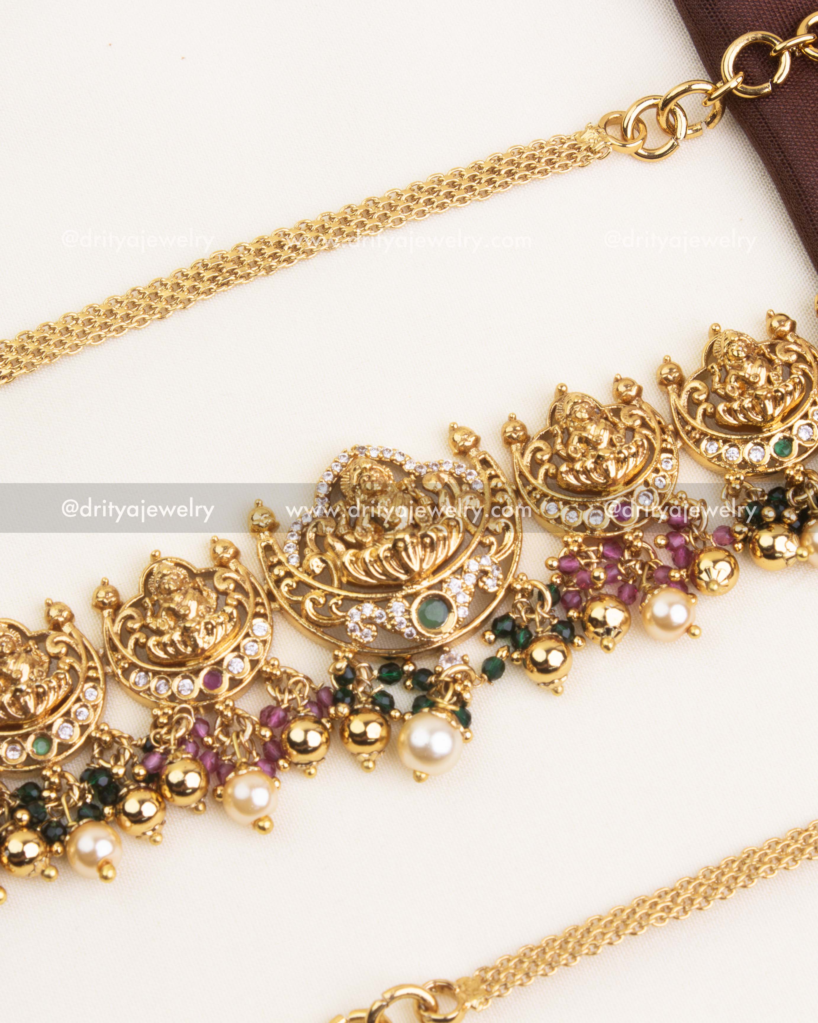 Premium temple hip chain with antique polish, adjustable links, and intricate Nakshi detailing.