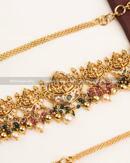 Premium temple hip chain with antique polish, adjustable links, and intricate Nakshi detailing.