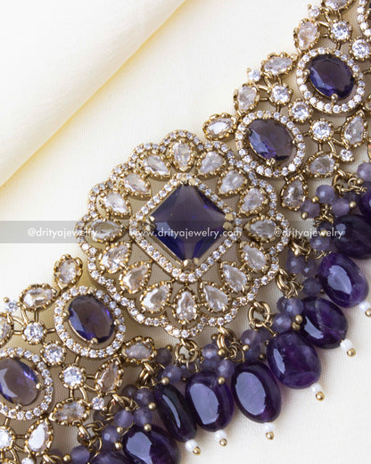 Detailed close-up of a Victorian-inspired choker with intricate amethyst and zircon stone settings.