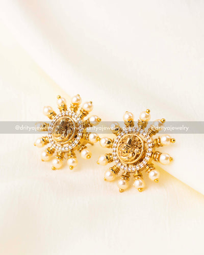 Detailed view of gold-finish temple studs adorned with white pearls and American diamonds.
