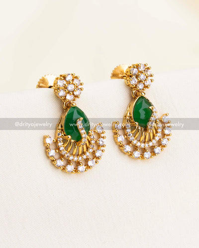 Matching green CZ peacock earrings with flower top design