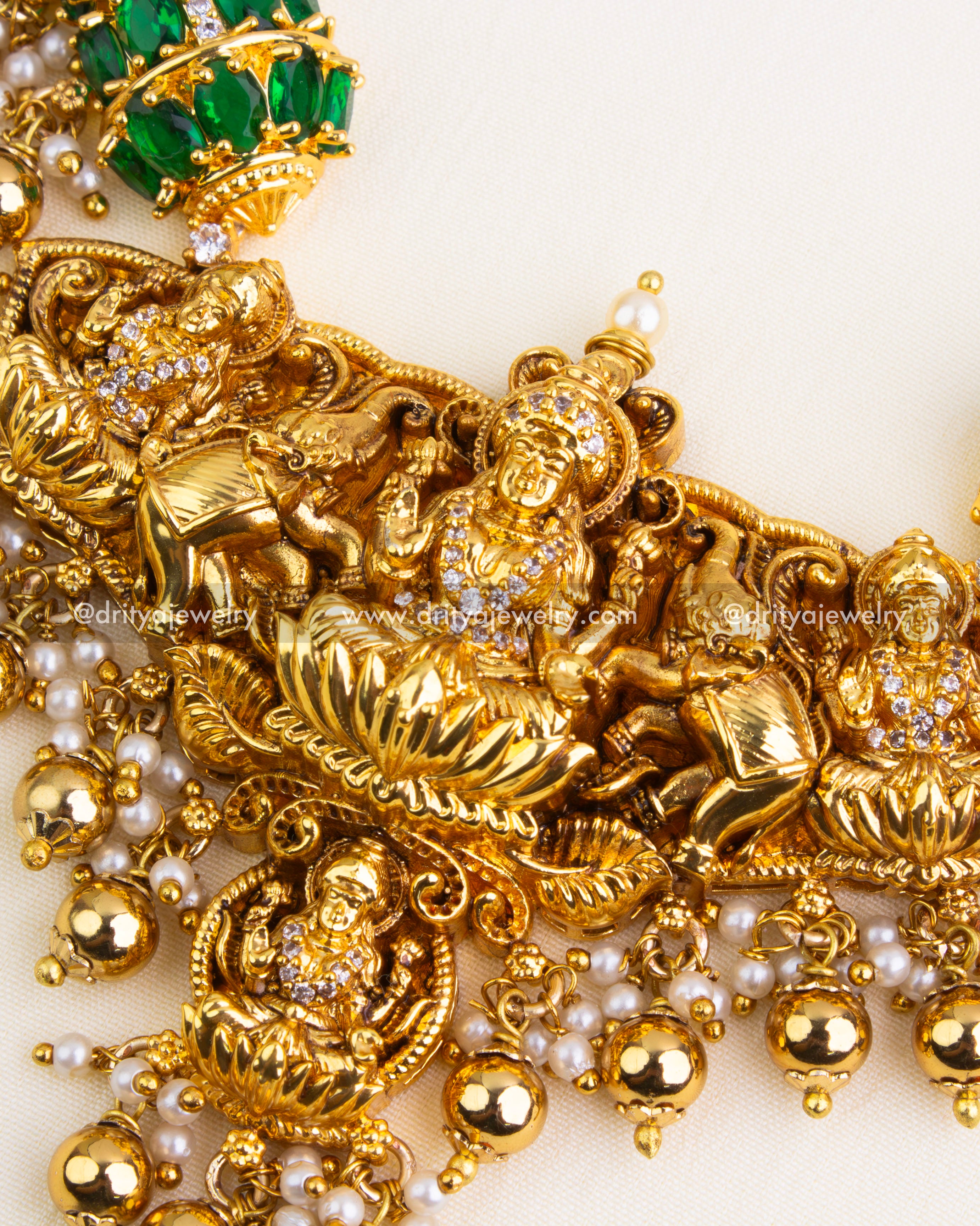 Intricate temple motif of Goddess Lakshmi with elephants