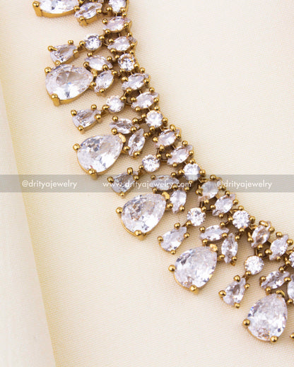 Detailed view of cascading stone arrangement in necklace