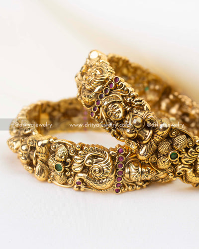 Premium Nakshi temple bangles featuring goddess Lakshmi carvings and antique polish