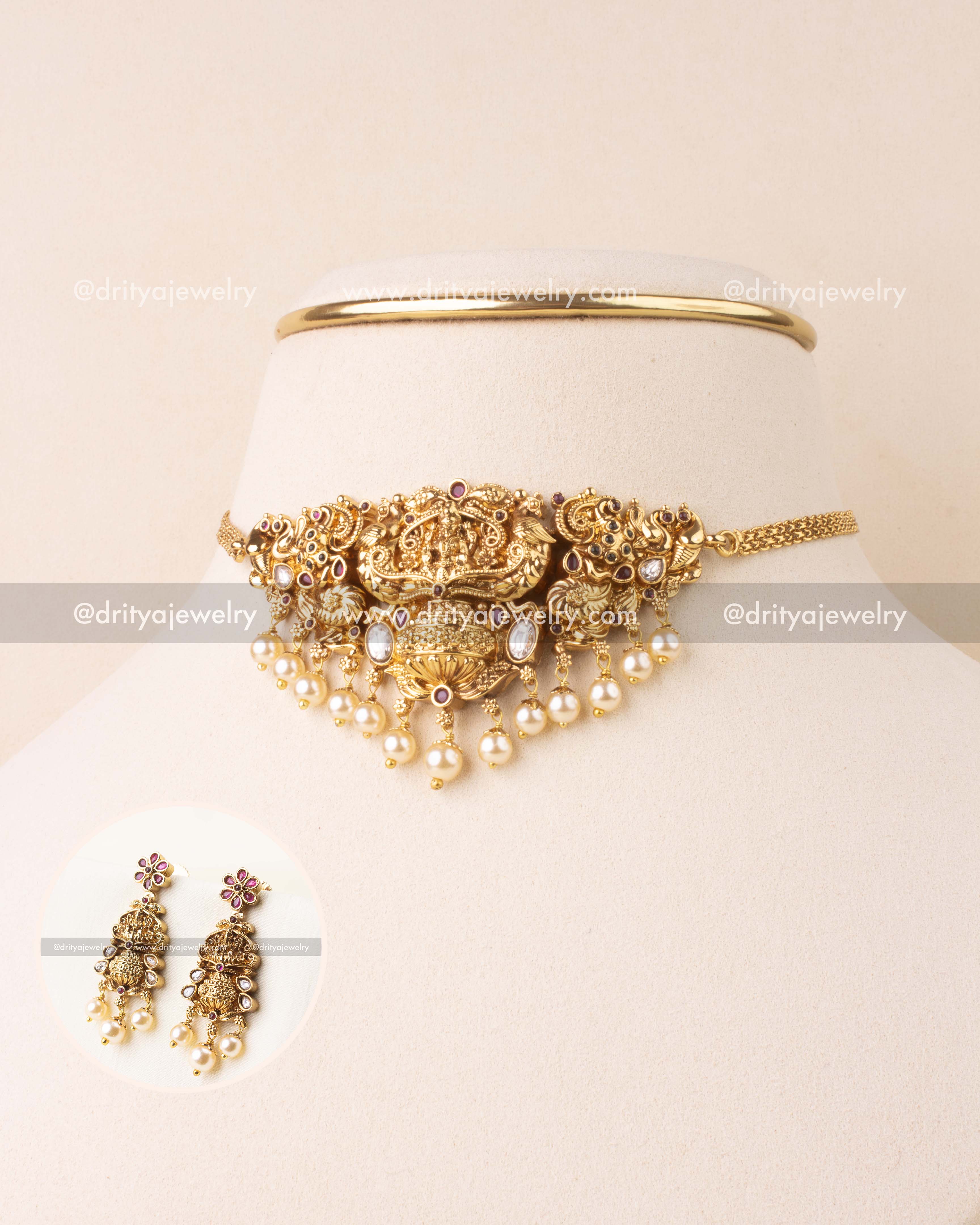 Full temple jewelry set with choker and earrings on display
