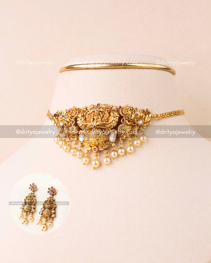 Full temple jewelry set with choker and earrings on display