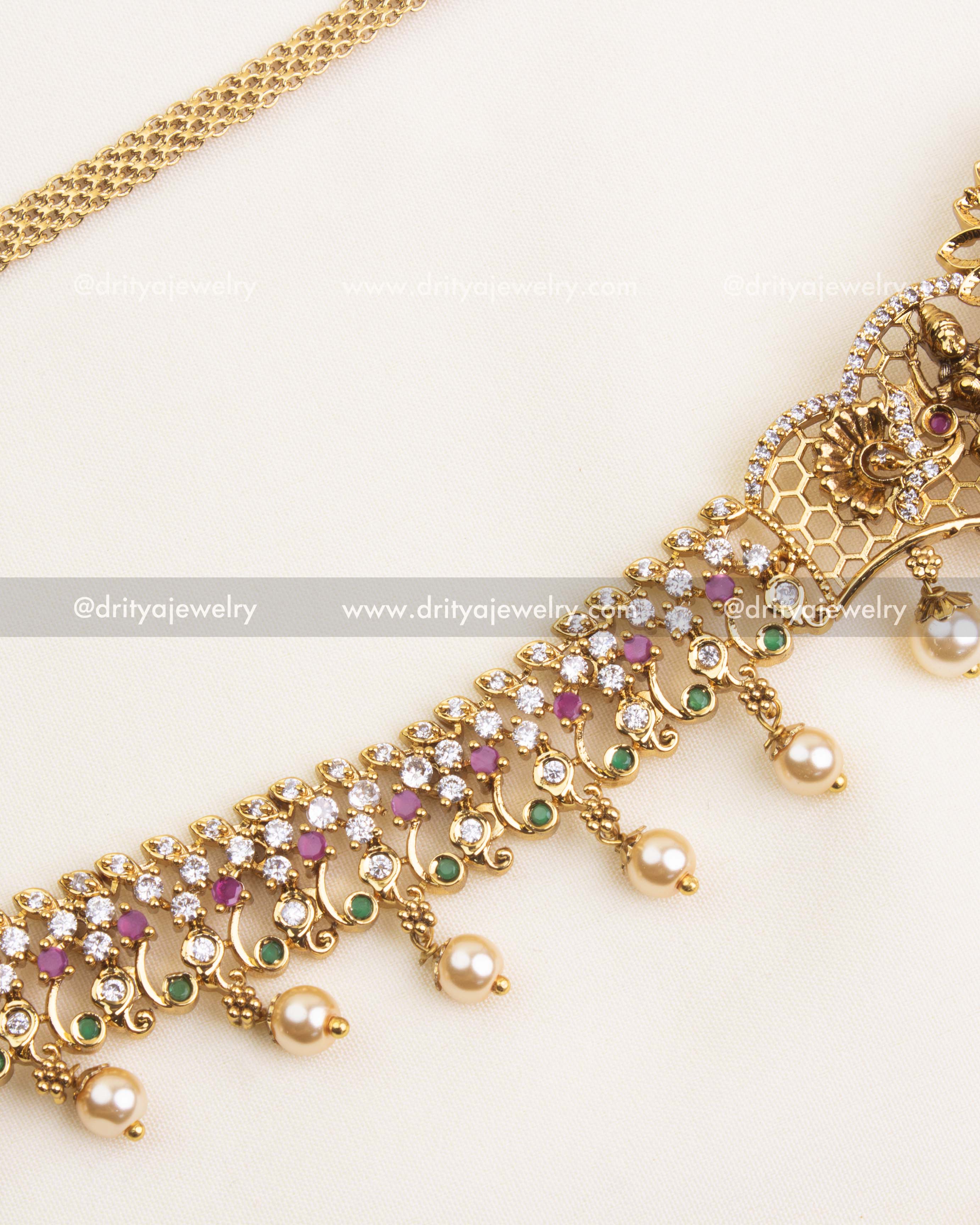 Premium hip chain with antique polish, secure chain links, and traditional motif centerpiece.