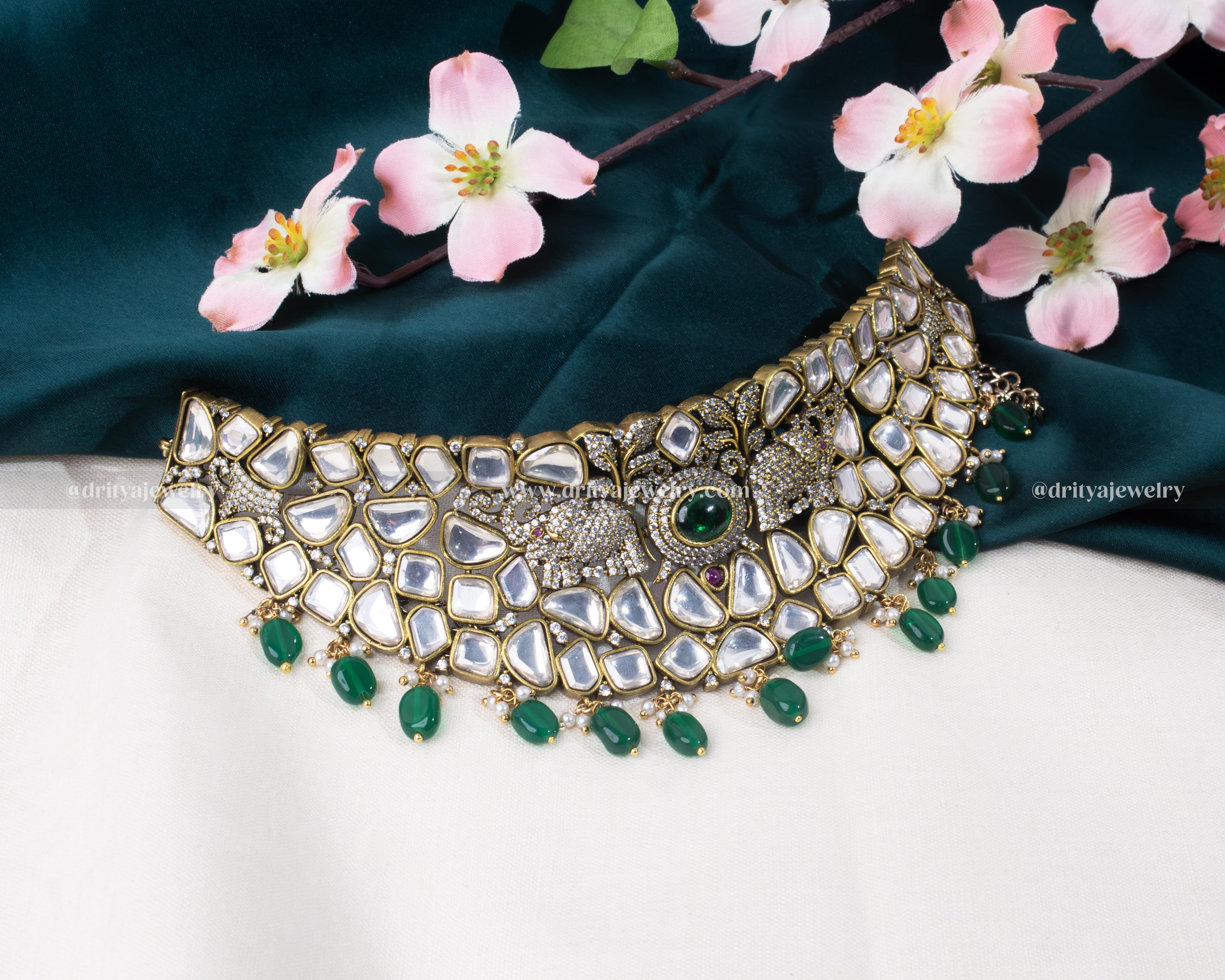 Close-up of the intricate Kundan work and traditional motifs on Dritya Jewelry’s choker.