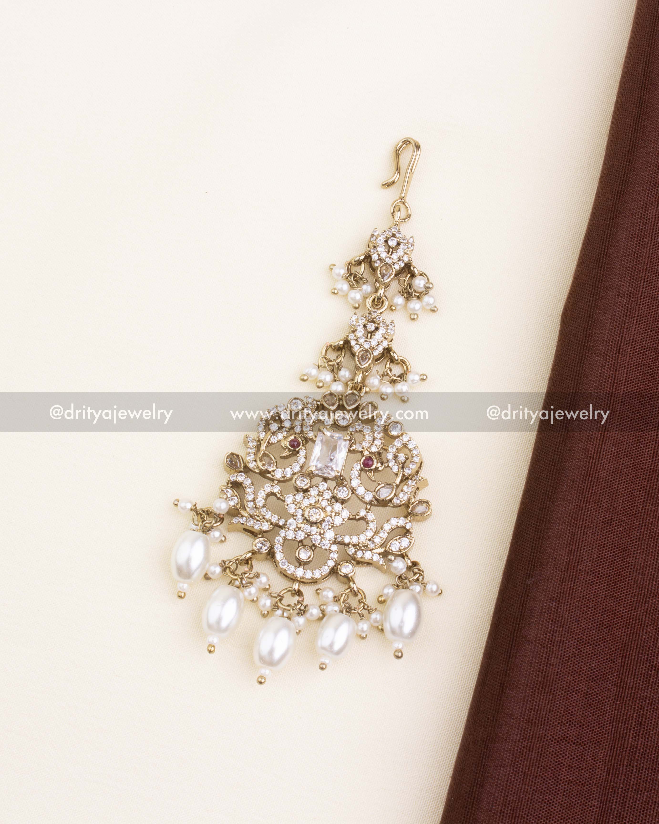 Clear crystal Victorian maang tikka with CZ stones and pearl danglers.