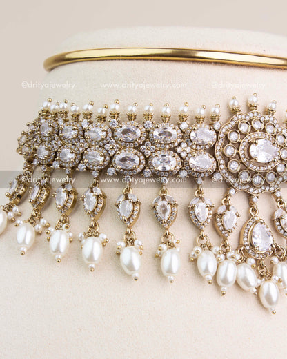 Intricately crafted Victorian choker with clear stones and lustrous pearl drops.