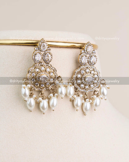 Statement Victorian earrings with diamond white CZ crystals and oval pearls for elegant looks.