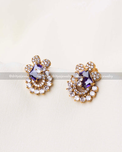 Detailed view of a premium CZ pendant set featuring a striking purple gemstone.