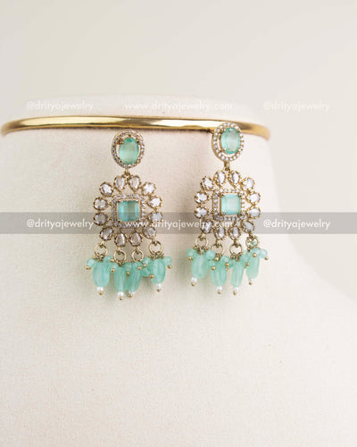 Victorian-style earrings with mint stones, CZ clusters, and hanging beads.