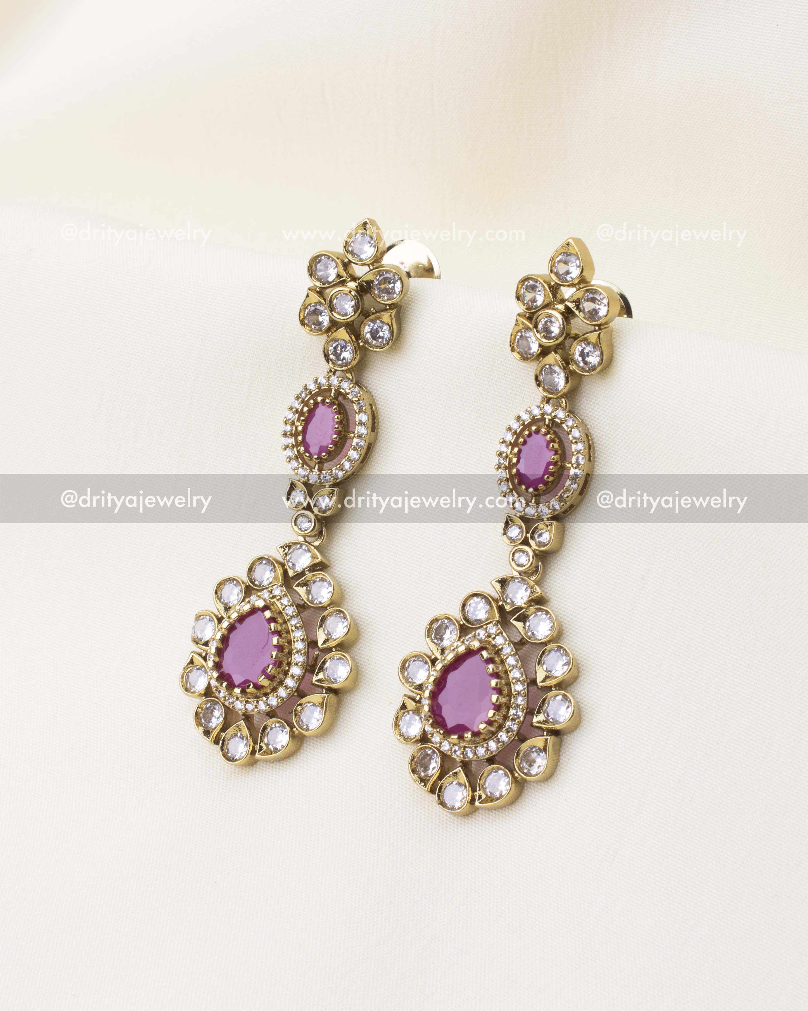 Victorian style earrings with ruby pink stones and gold-plated finish