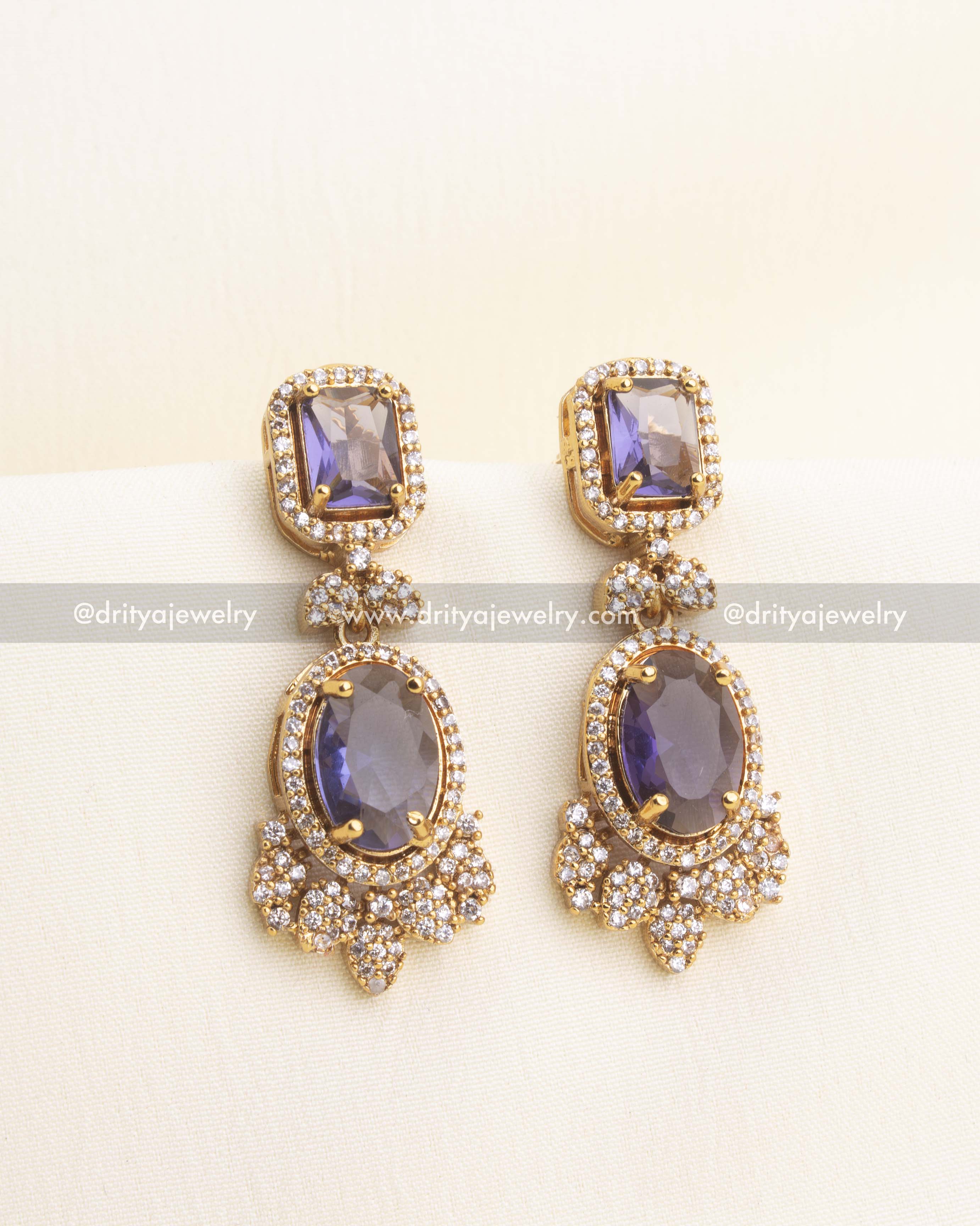 Purple CZ drop earrings with cushion & oval stones.