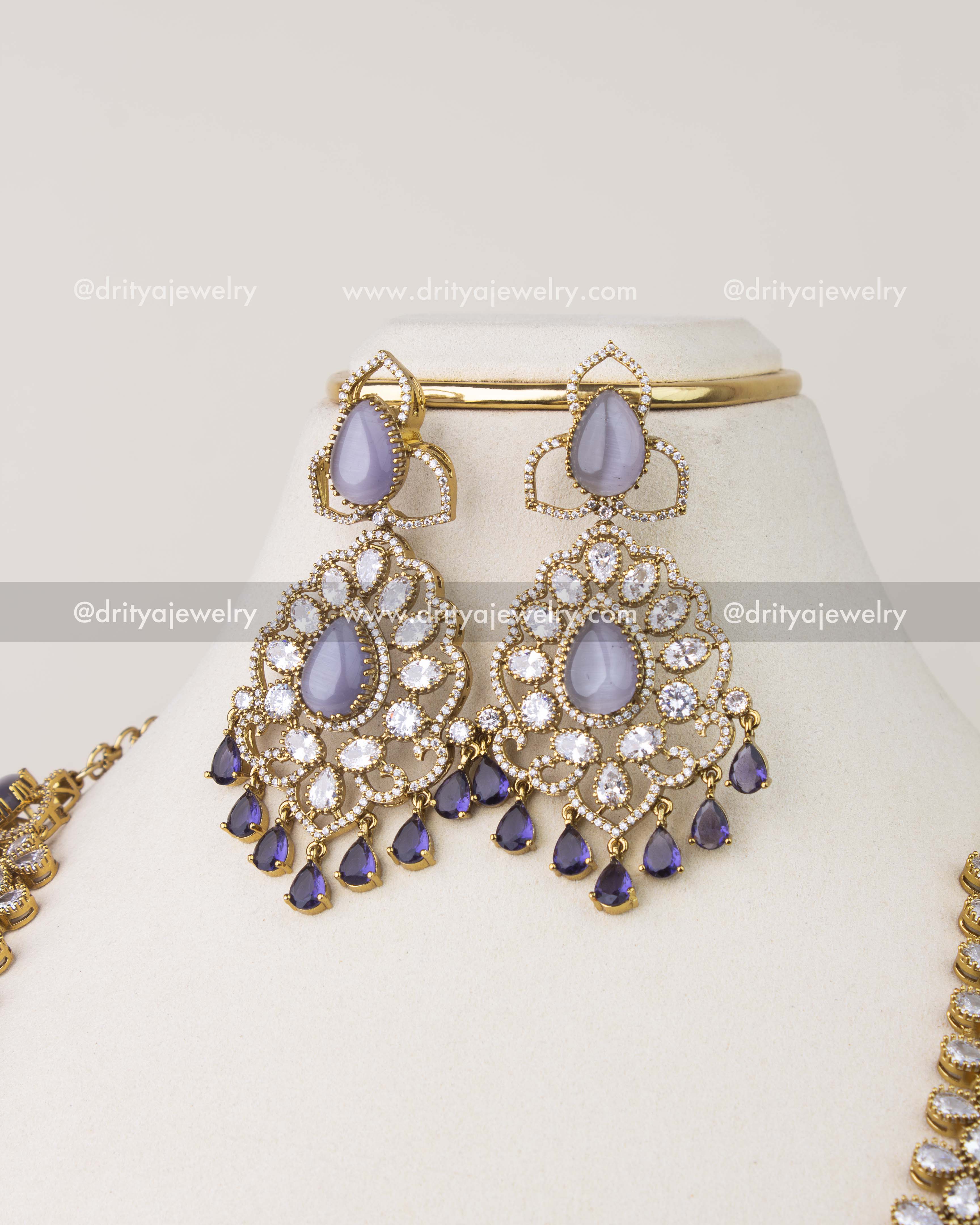 Matching Victorian earrings with purple stones and CZ embellishments