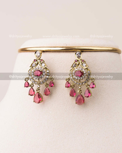 Victorian style earrings with ruby red drops and CZ stone detailing