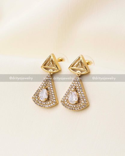 Matching diamond-alike CZ stud earrings with geometric design and gold polish