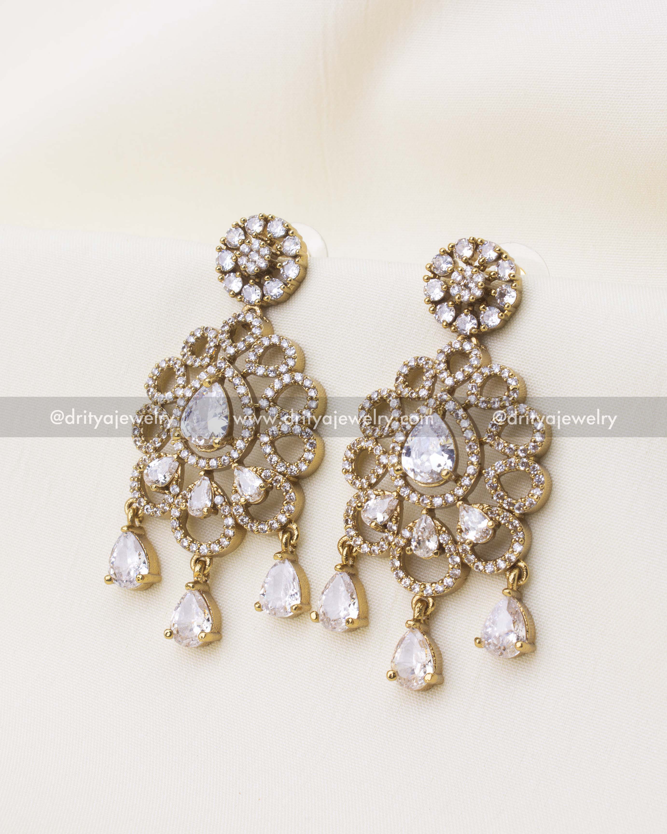 Victorian style diamond-alike CZ earrings with teardrop danglers and gold polish